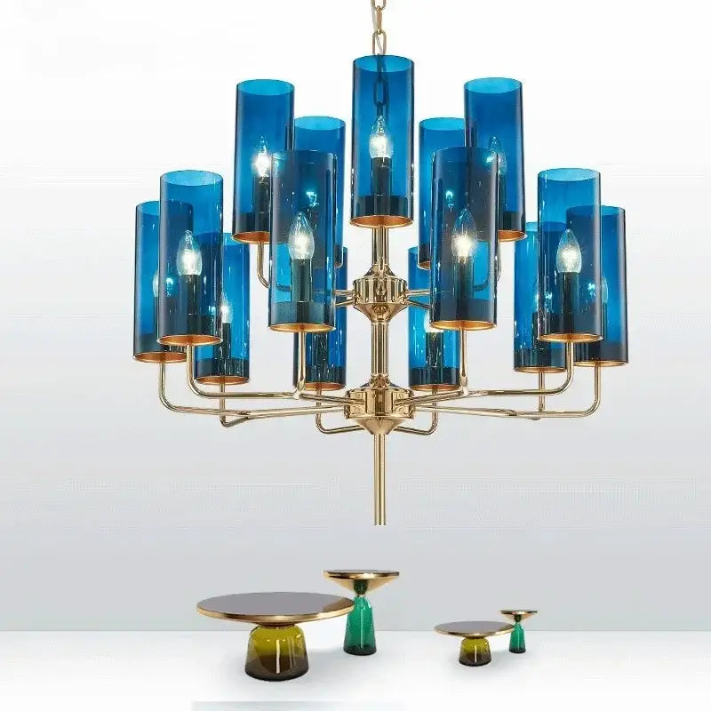 Blue cylindrical american lustre glass chandelier with brass accents and multiple lit bulbs for dining room decorbites