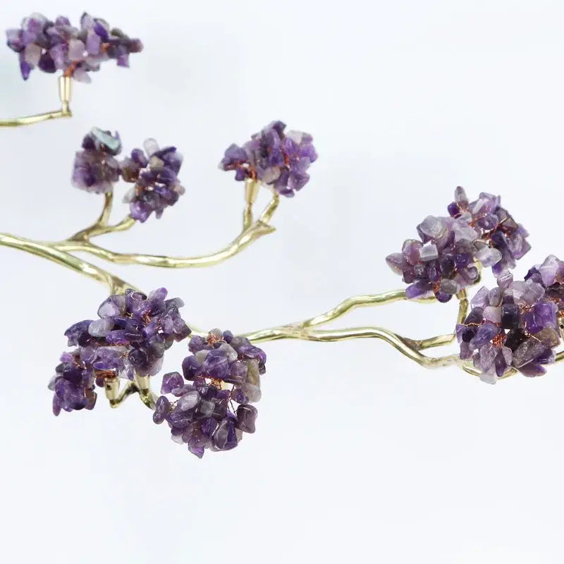Amethyst and gold metal decorative figurine featuring faceted purple stones on a brass metal decorative branch design