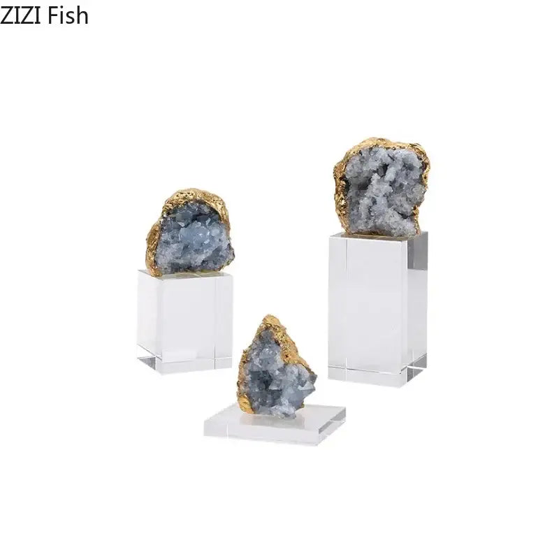 Set of three amethyst crystal base geodes with golden rimmed interiors on clear acrylic pedestals desk ornament