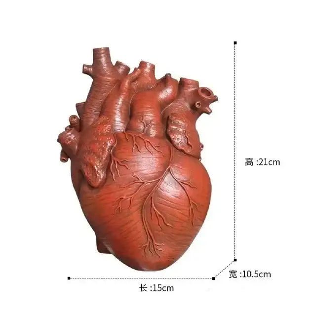 Red ceramic anatomy heart vase with detailed features by DecorBites™ perfect as a unique Valentine’s Day dry pot gift