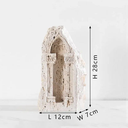 A textured off-white stone ancient greek roman temple bookend with intricate gothic arch carvings for home decor