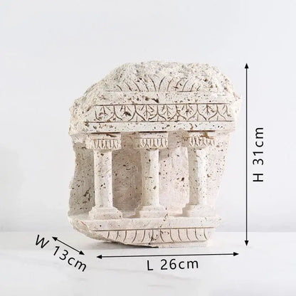 A weathered off-white stone replica of ancient greek roman temple bookends with carved columns for home decor
