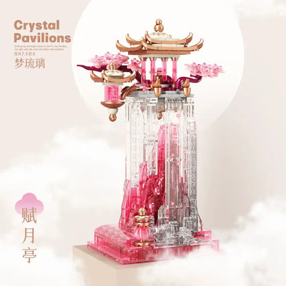 Translucent pink and clear plastic glass fu yue yue pavilion ornament with gold accents and cherry blossom decorations