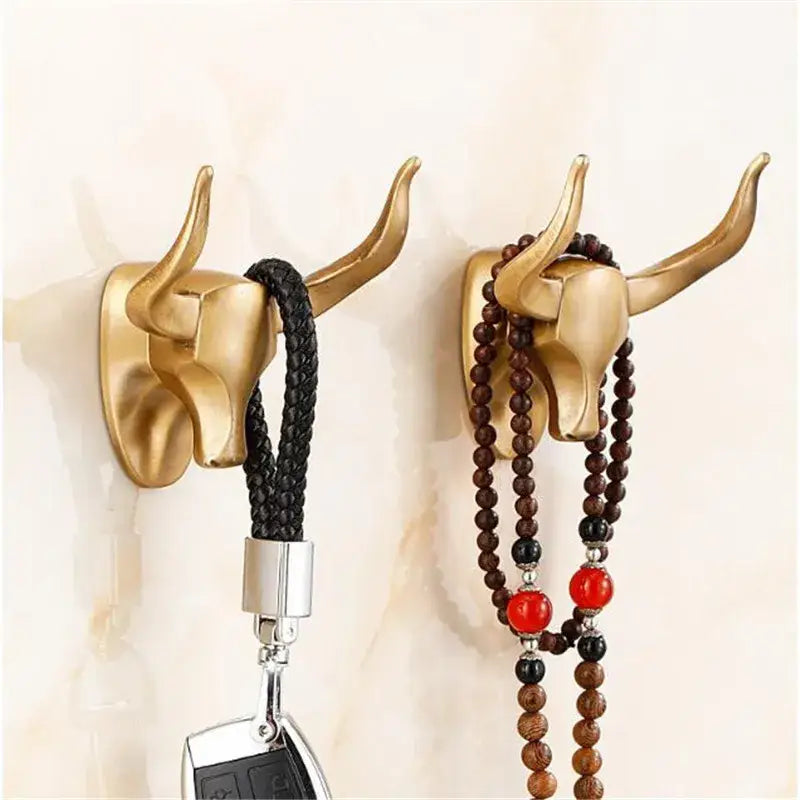 Gold-colored decorbites antique aluminum bull head robe hook with polished metallic finish for bathroom clothes hanging