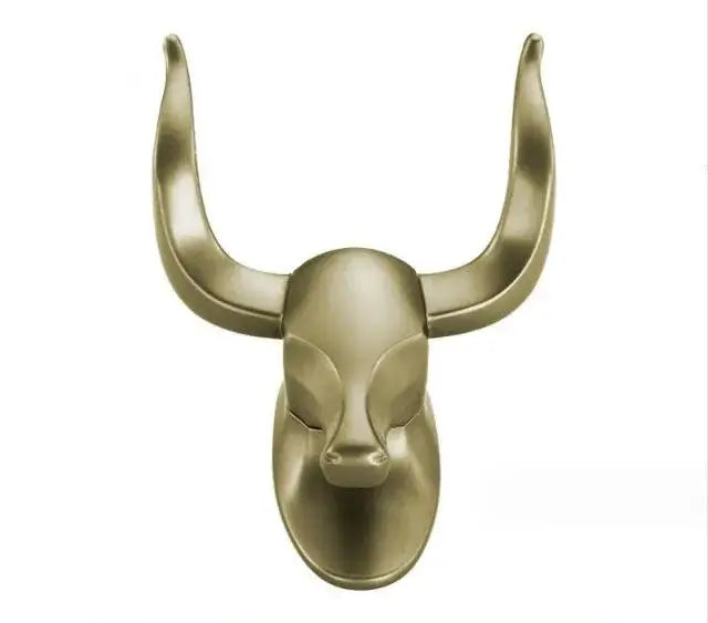 Gold-toned decorbites antique aluminum robe hook featuring a metallic bull head with polished curved horns for bathroom use