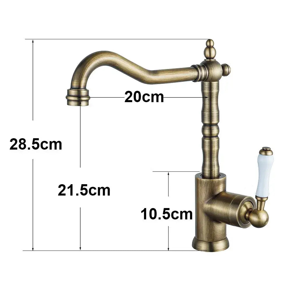 Antique brass-finished kitchen faucet with curved spout and white ceramic handle for decorbites black antique kitchen use