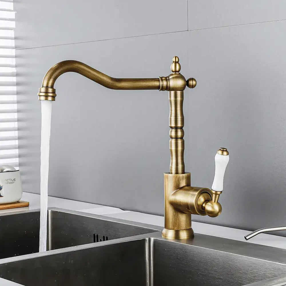Antique black and white ceramic kitchen faucet with brass finish and ornate vintage design by decorbites black antique