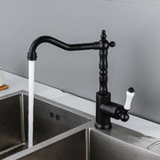 Antique black and white ceramic kitchen faucet with black matte finish and ornate decorbites black antique detailing single lever tap
