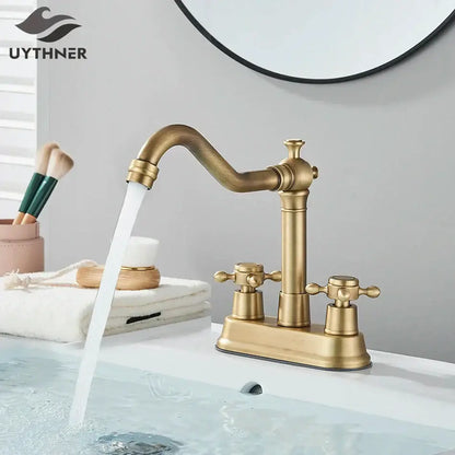Antique black brass waterfall basin faucet with antique brass finish curved spout and two cross-handle knobs decorbites black brass