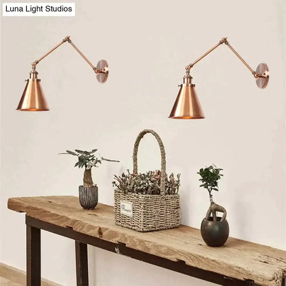 Copper-finished antique adjustable wall lamp sconce with articulated arms and conical shades for bedroom lighting