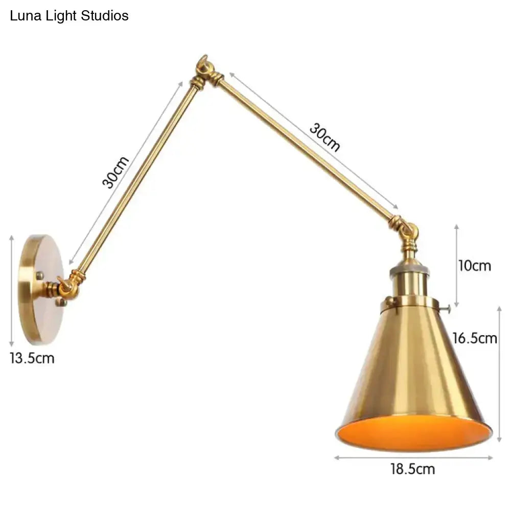 Antique adjustable wall lamp with brass finish, conical shade, and orange interior for bedroom lighting