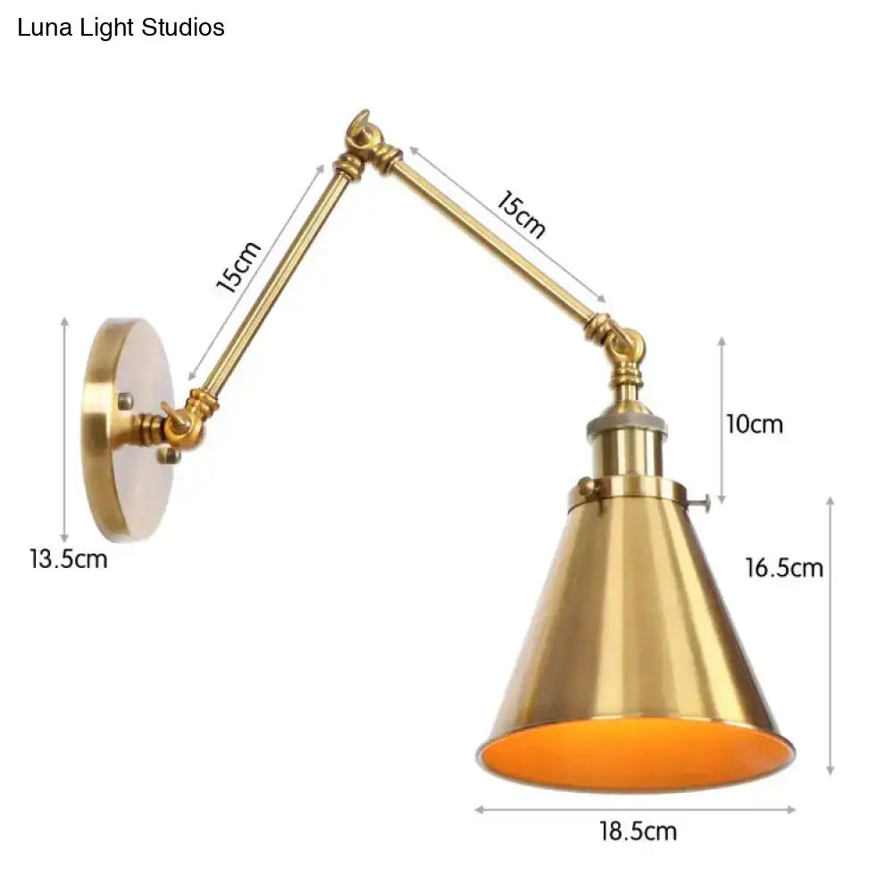 Brass-finished antique adjustable wall lamp sconce with conical shade and orange interior for bedroom light