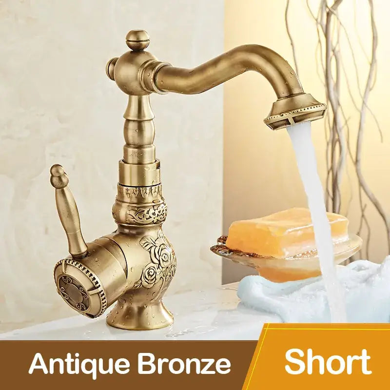Antique black bronze basin mixer tap with ornate rose engraving and curved swivel spout for bathroom basins