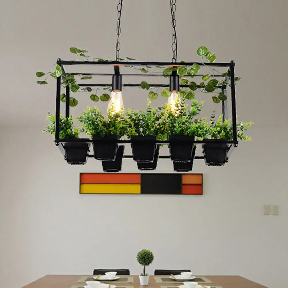 DecorBites antique black metal island pendant with two heads, LED lighting, and integrated planters with green foliage
