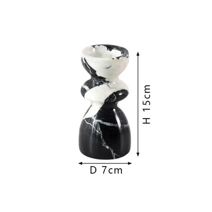 A sleek black and white marble candlestick holder with modern sculpted design for dining room decorbites grand antique decor