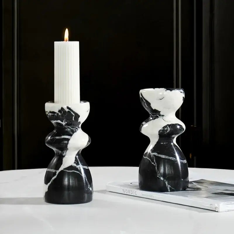 Black and white marble candlestick holder with sculpted organic design ideal for decorbites grand antique dining room decor