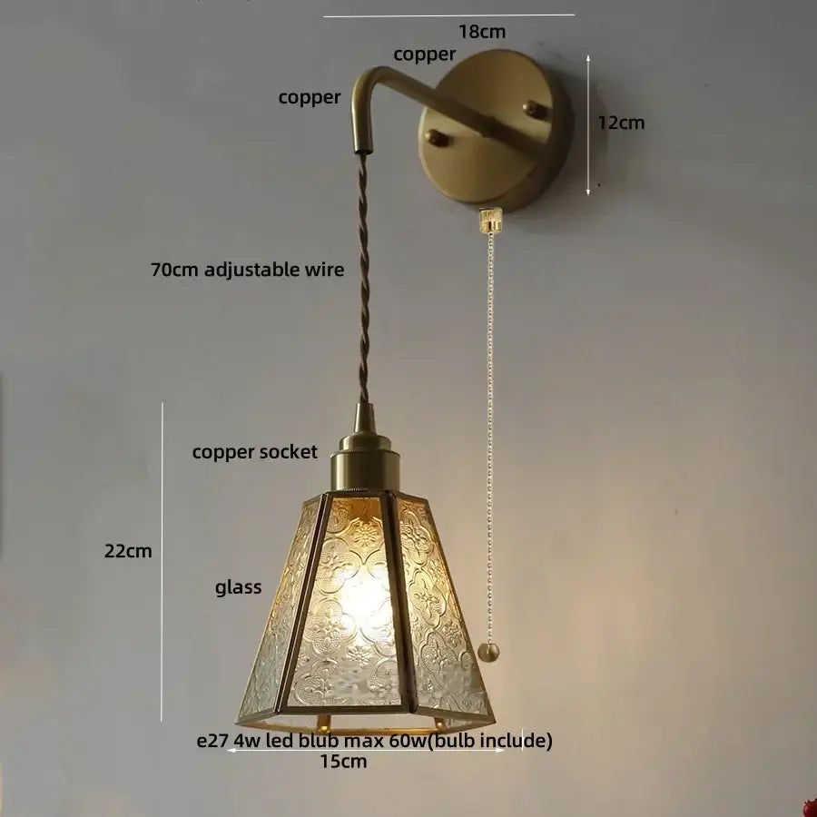 Antique brass-finished copper wall sconce with blue glass led textured shade and adjustable 70cm wire from decorbites blue glass