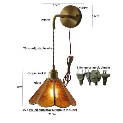 Antique blue glass led wall sconce with copper finish, textured amber glass shade, and adjustable 70cm wire decorbites blue glass