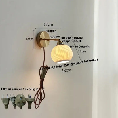 Antique brass and amber glass adjustable wall light with copper arm and decorbites ceramic led white ridged lampshade