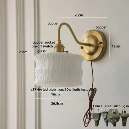 Antique brass wall sconce with textured clear glass shade for bedroom lighting by decorbites clear glass