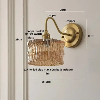 Antique brass wall sconce with clear textured amber glass shade for bedroom decorbites clear glass lighting