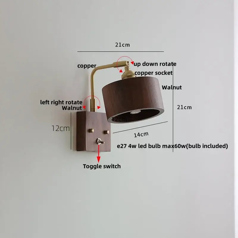 Walnut-finished wall lights with copper arm and clear glass fitting featuring adjustable up-down and left-right rotation