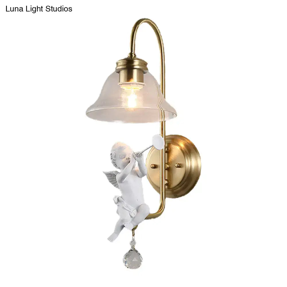 Antique brass angel glass sconce light with white angel figurine trumpet, frosted glass shade, and clear glass pendant