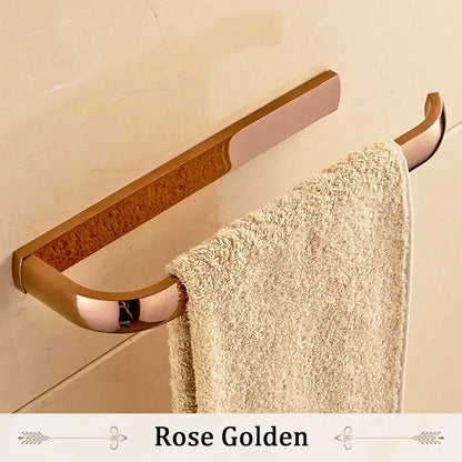 Rose gold towel rack with sleek modern design and brushed metal finish from decorbites brass bathroom accessories set