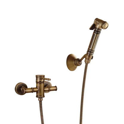 Antique brass bidet mixer faucet bathroom handheld shower set with ornate detailing and flexible hose