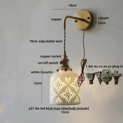 Antique brass ceramic led wall light with white ceramic lampshade and floral cutouts mounted on copper bracket for decorbites ceramic led wall use