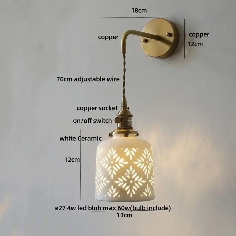 Antique brass ceramic led wall light bedroom sconce with white floral cutout pattern copper hardware and adjustable wire
