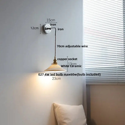 Antique brass ceramic led wall sconce with ribbed glass, white ceramic shade, and adjustable iron arm for bedroom decorbites ceramic led