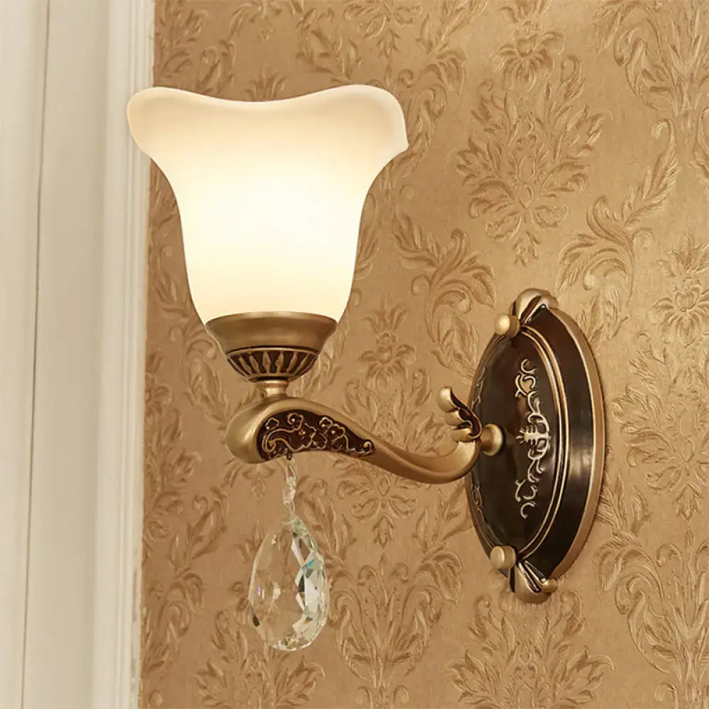 Antique brass wall lamp with frosted glass shade and ornate crystal droplet compatible with e12 e14 base