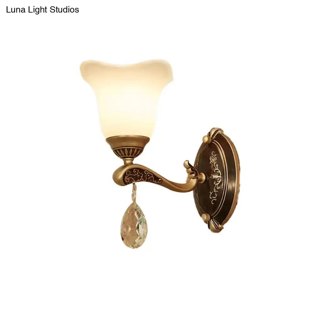 Antique brass wall lamp with frosted glass shade and crystal drop featuring e12 e14 base for bedroom sconce use