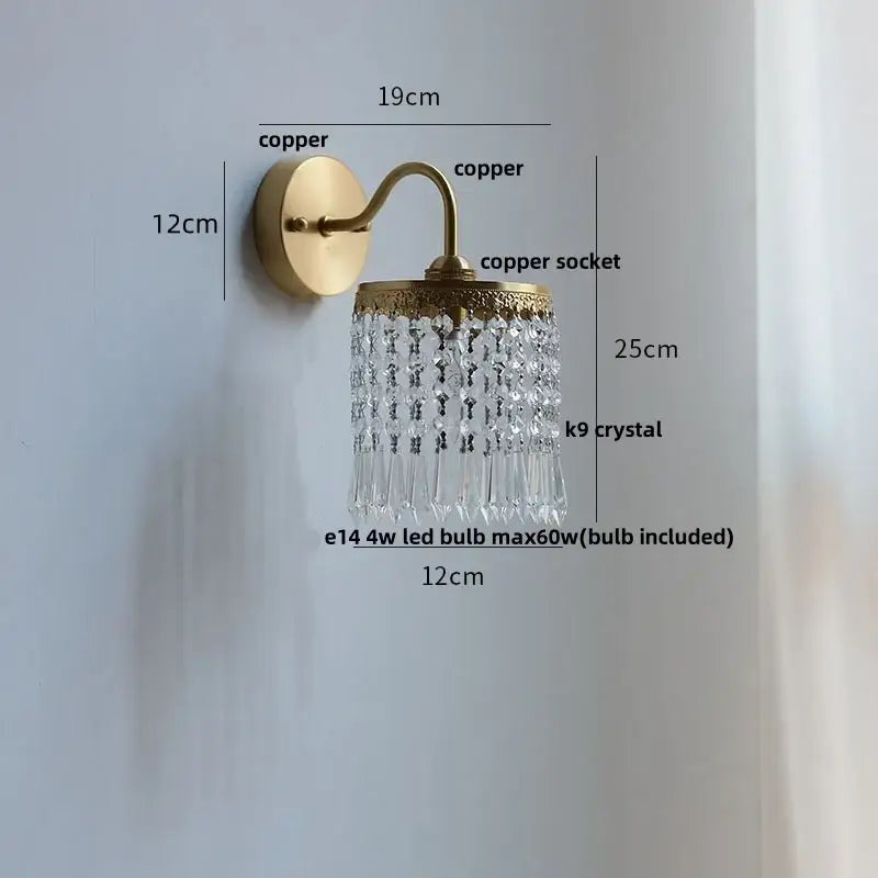 Antique brass crystal led wall sconce with a cascading fringe of clear k9 crystal beads by decorbites crystal led
