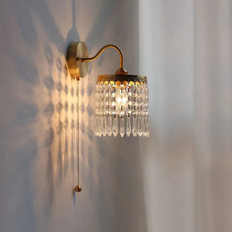 Antique brass crystal led wall sconce with cascading clear crystal teardrop pendants for elegant decorbites crystal led lighting