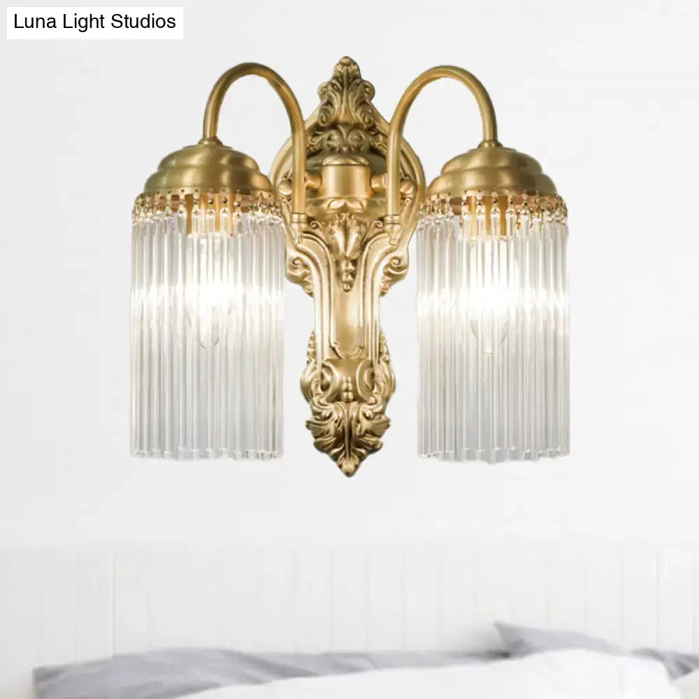 Antique brass crystal rod wall sconce with two lights ornate detailing and cascading crystal prisms for corridor lighting