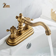 Antique brass deck mounted double handle basin sink faucet with brass housing material and vintage curved spout design