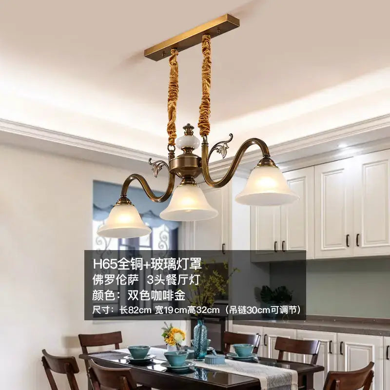 Antique brass decorbites coffee colored three headed pendant light with brass finish glass shades and twisted rope suspension