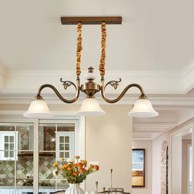 Antique brass decorbites coffee colored pendant light with three frosted glass shades and twisted rope chains for dining room