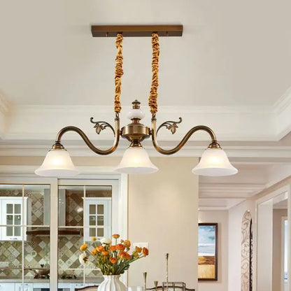 Antique brass decorbites coffee colored pendant light with three frosted glass shades and twisted rope chains for dining room