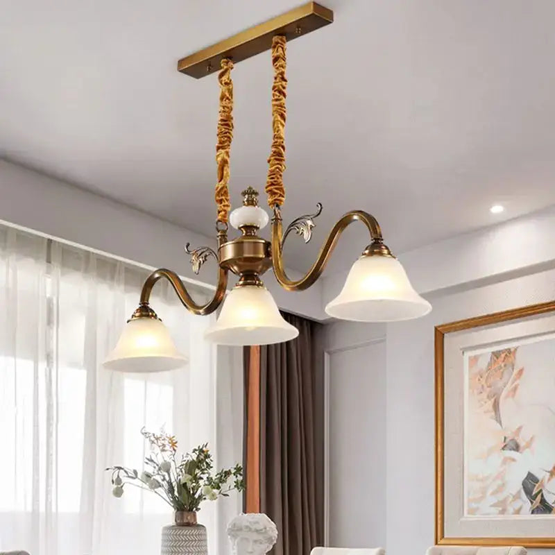 Antique brass decorbites coffee colored three headed pendant light with frosted glass shades for dining room lighting