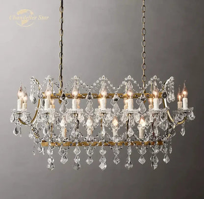 Antique brass decorbites crystal iron chandelier with cascading clear crystal droplets and candle-style bulbs for dining room