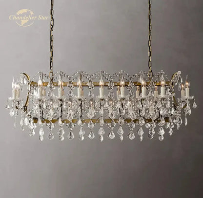 Antique brass decorbites crystal iron chandelier with cascading clear crystal droplets and candle-style bulbs for dining room