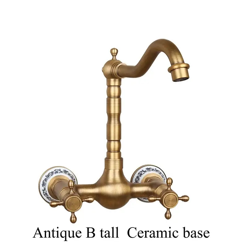 Antique brass dual handle kitchen faucet with tall curved spout and porcelain plate knobs for hot water control