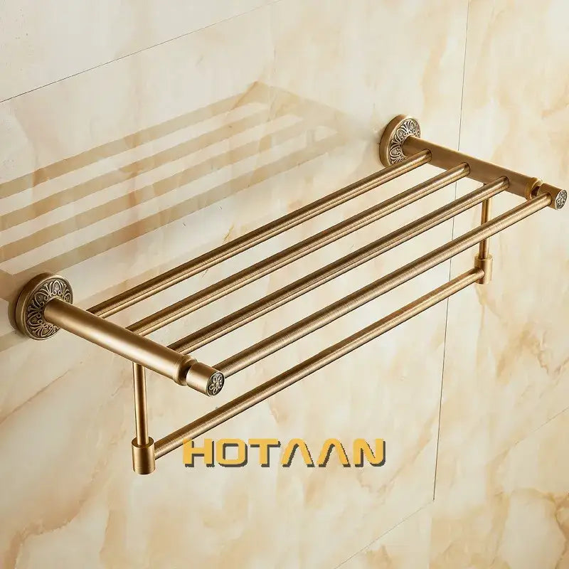 Antique brass floral double towel rack with four tiers and ornate circular wall mounts for bath towel storage by decorbites brass bath