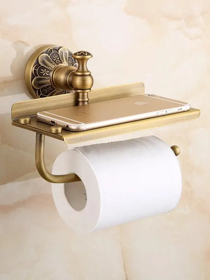 Antique brass toilet paper holder with ornate wall mount and shelf from decorbites brass bathroom hardware set