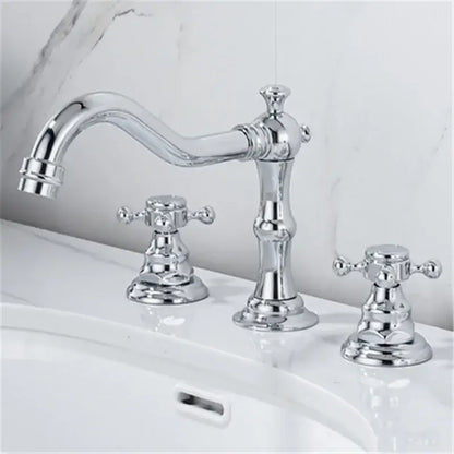 Antique brass gold finish bathroom sink faucet with chrome finish curved spout and two vintage cross-handle knobs