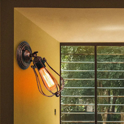 Vintage-style dark bronze industrial wall lamp with exposed Edison bulb in wire cage for bedroom decorbites industrial wall use