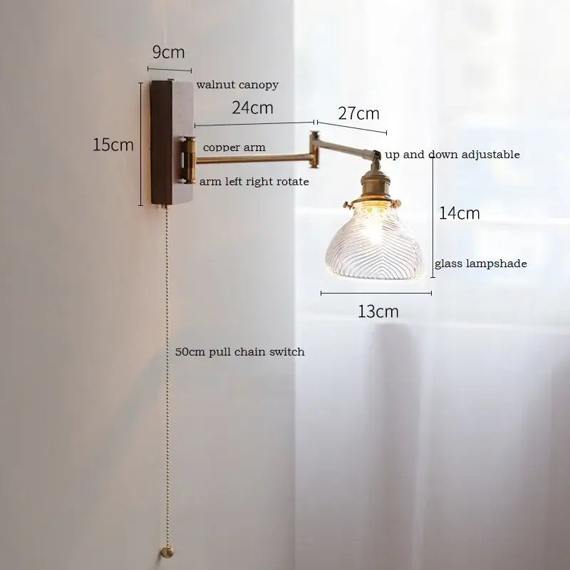 Adjustable copper-arm wall light with walnut canopy and decorbites clear glass lampshade for bedroom decor